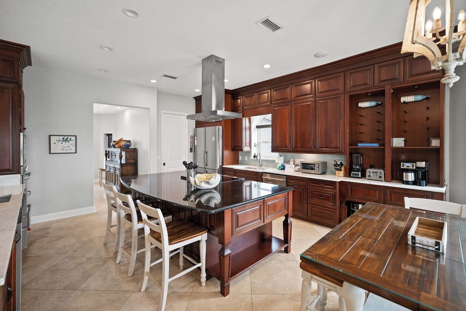 Double Fride/Freezer, 36 Inch Range/Oven, and lots of Countertop appliances.