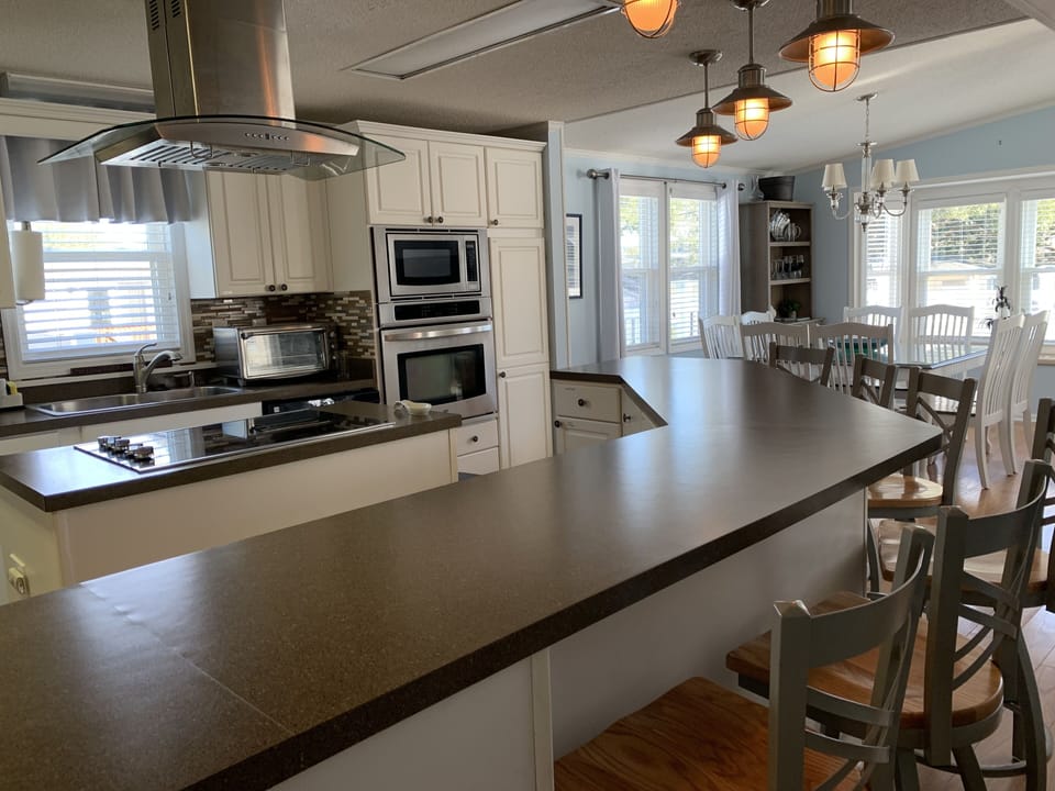 Plenty of counter space and seating for 6 at the kitchen bar