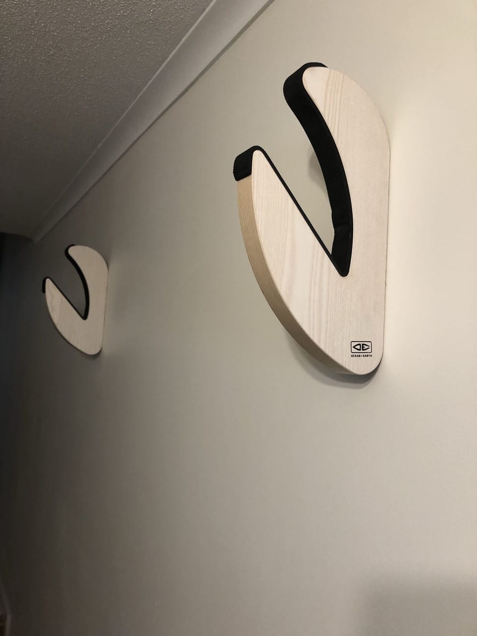 Wall mounted surfboard rack
