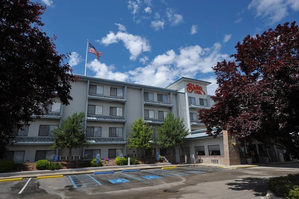 Pull up to a welcoming entrance under bright blue skies.
