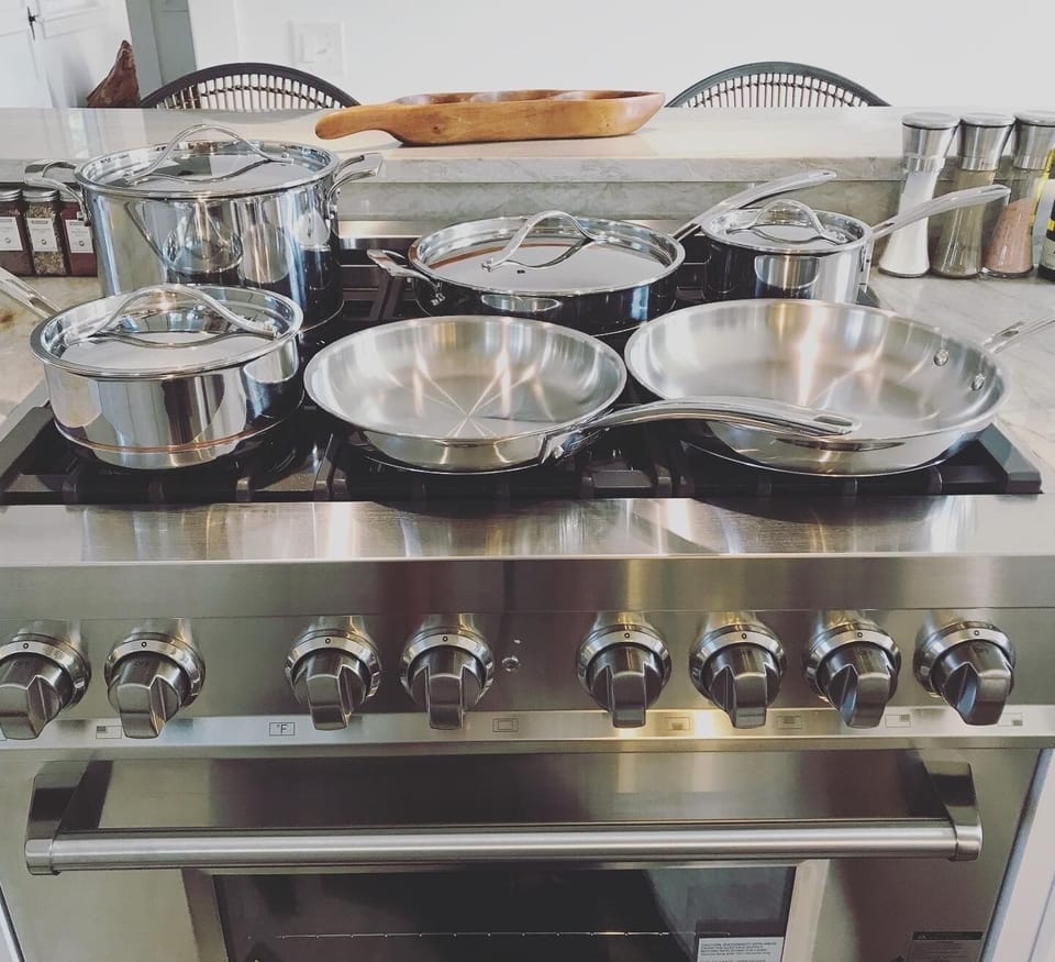 Fully-equipped, kitchen has a cook-your-heart-out 36'’ range stove and hood. 