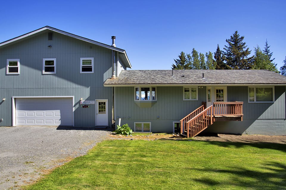 Apartment sits above the garage on the left side of the main house