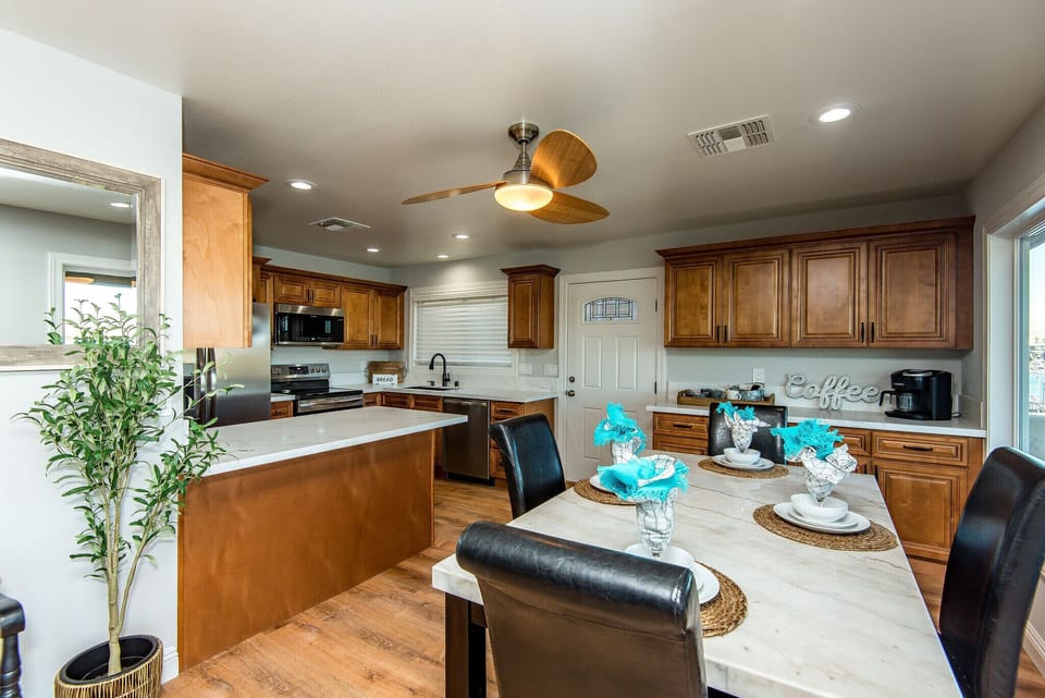 Main level kitchen that is fully stocked