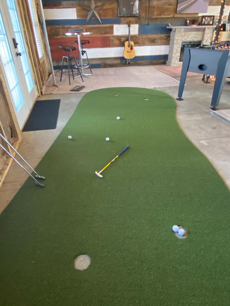putting green in lower level.  there are 14 steps up to the middle level