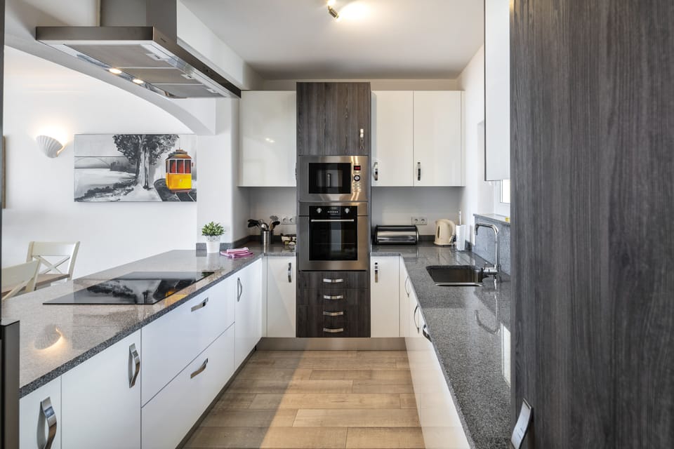 The superb modern kitchen - one can stand at the hob and look at the view 