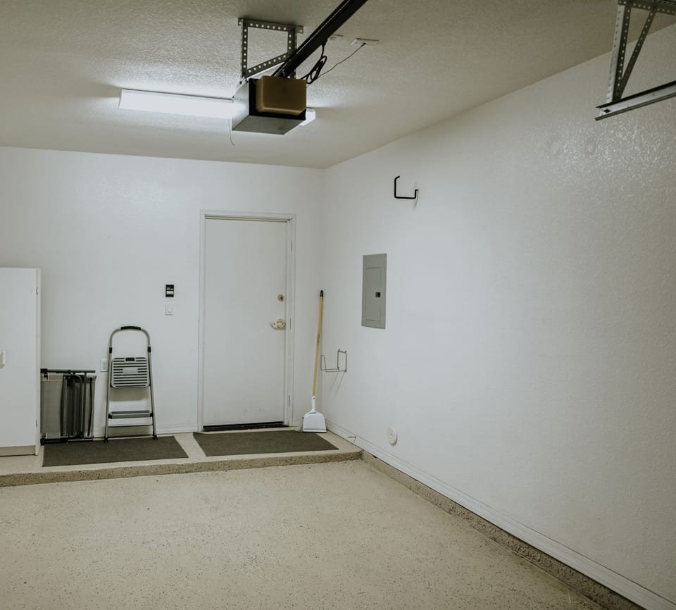 One car garage for parking or you may park in the lot.