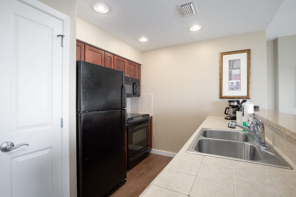 Fully stocked Kitchen - refrigerator, stove/oven, microwave, dishwasher, coffee pot, sink, all dishes and pots/pans that you'd need