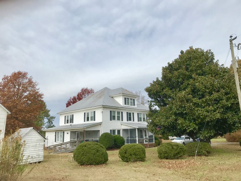 This is a picture of the house facing the driveway.
