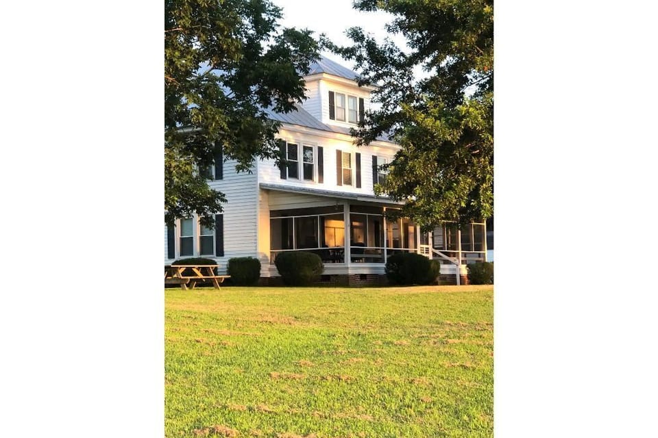 The front porch is a favorite spot to watch the sunset across sturgeon creek. 