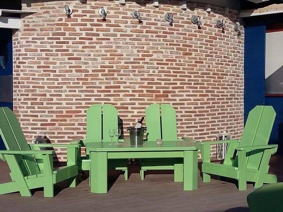 Enjoy a nice bottle of wine next to the sea.