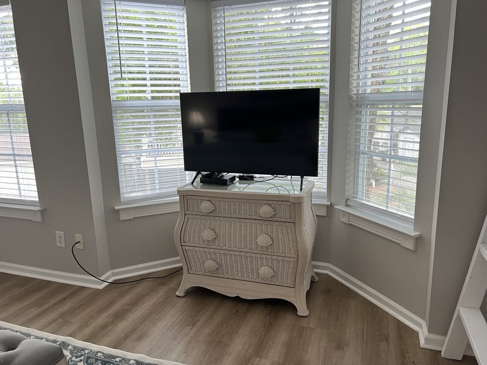 Large flat screen smart TVs in each room