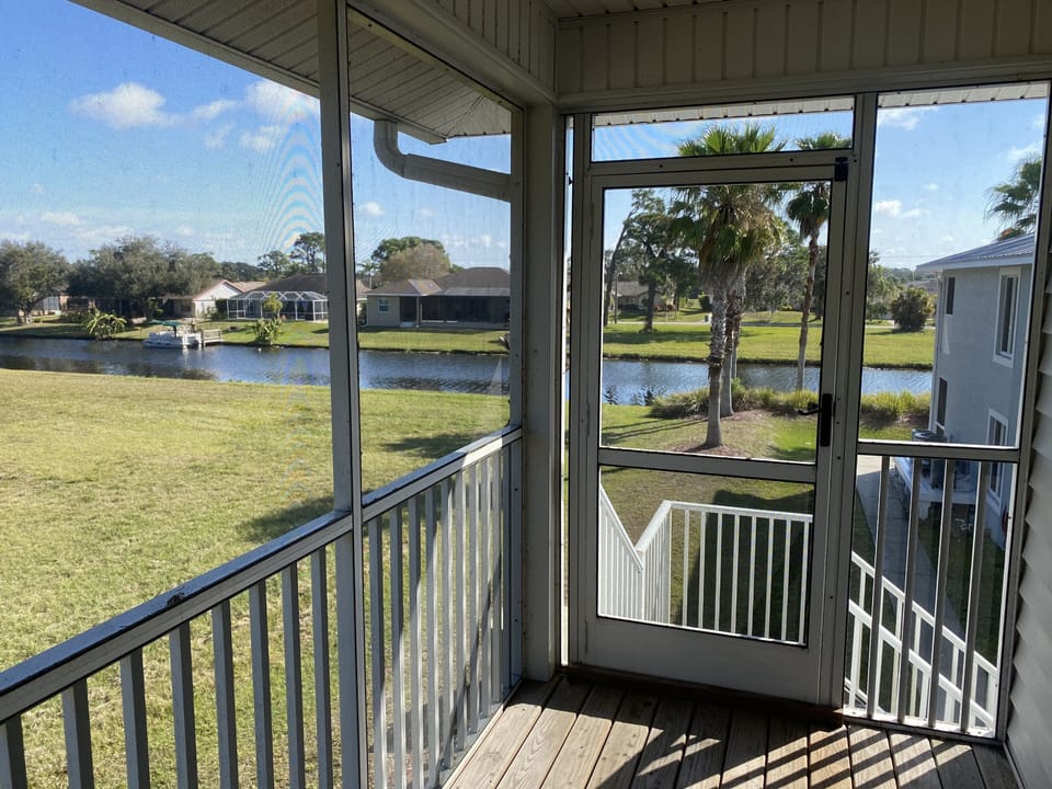 Lanai Side Door w/ Stairs on Side of Condo
