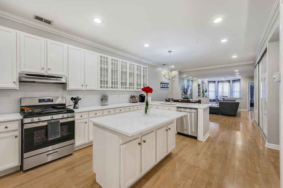 Check out the large kitchen! Stocked with utensils, dishware, and a KCup machine