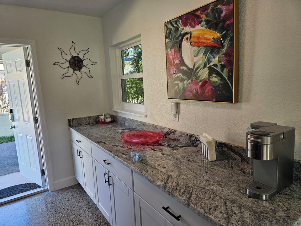 Large storage cabinets with granite countertop for prep