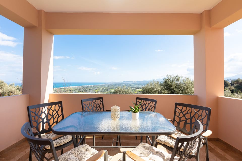 Outdoor dining area in the balcony.
