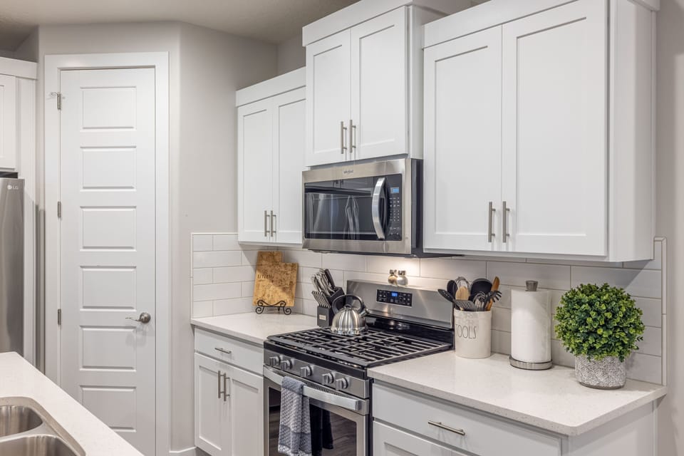 Kitchen - The Kitchen is complete with everything you will need for meal preparations including pots, pans, baking dishes, plates, cups, silverware, cutlery, and an assortment of cooking utensils.