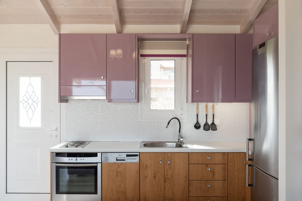 A second fully equipped kitchen sprawls on the first floor.