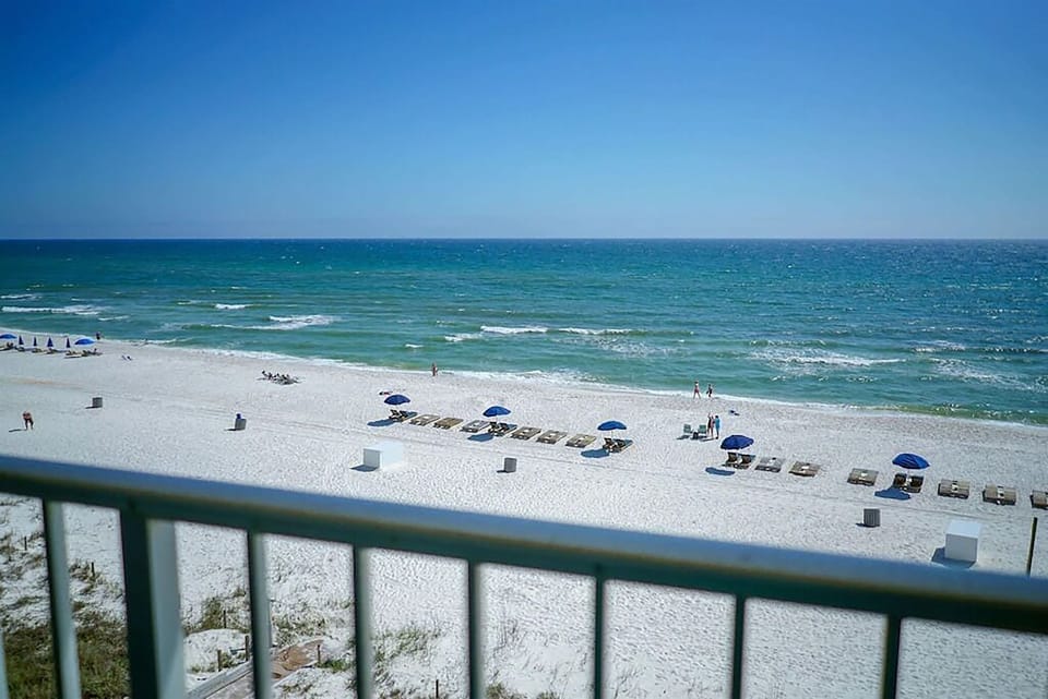 View from private balcony and only steps to white sand!