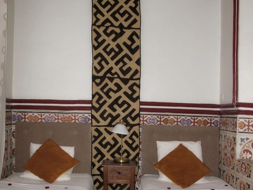 Suite Familiale chambre avec deux lits