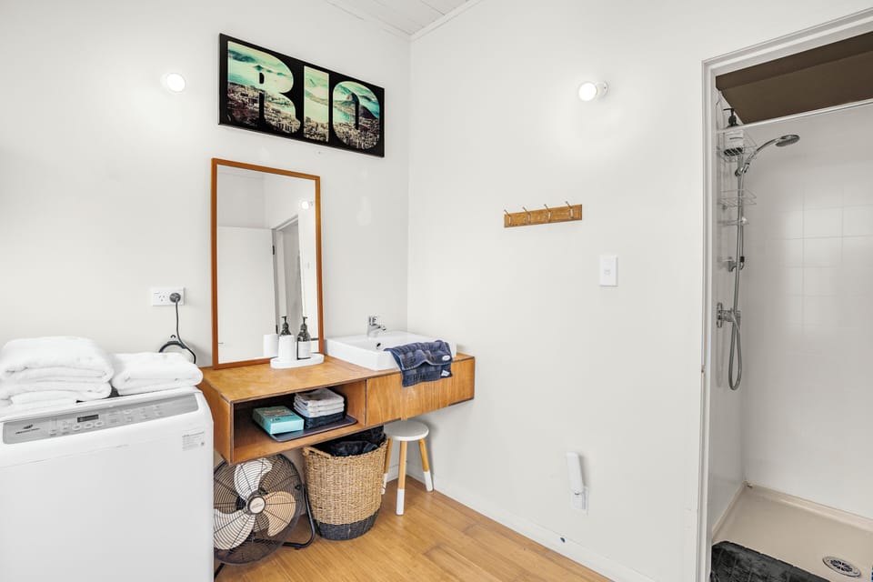 Bathroom with the shower, 2nd vanity and laundry