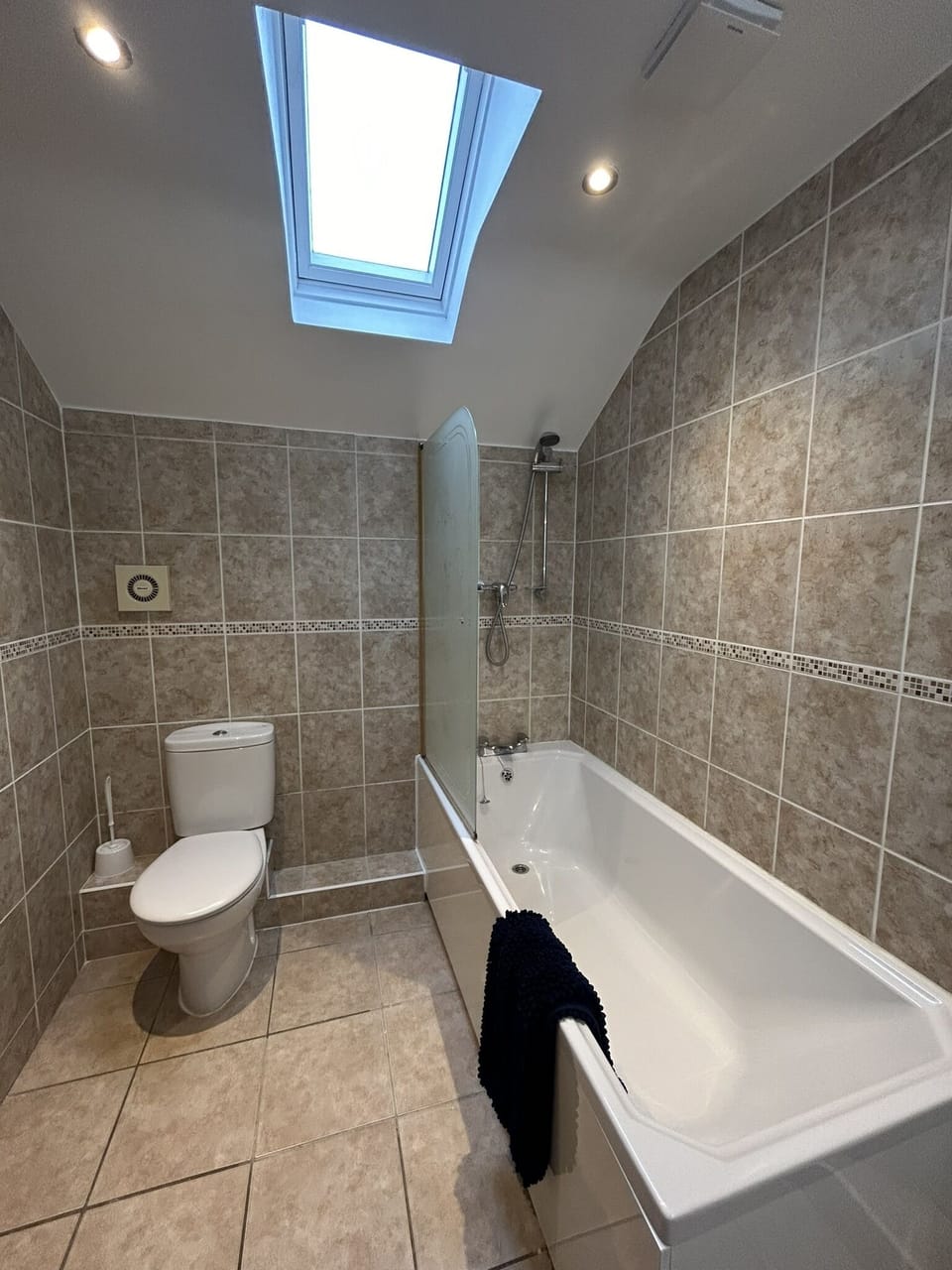 Room 3 - Bath with overhead shower