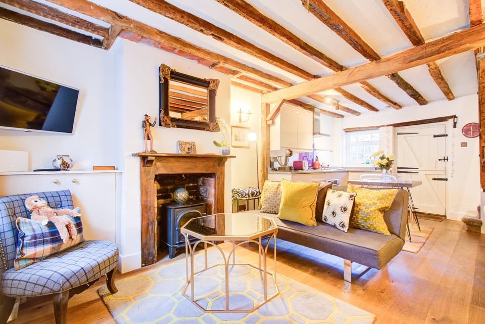 Cosy open plan living area with electric fireplace