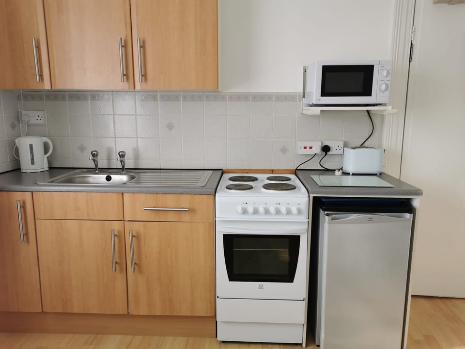Fully equipped kitchen area - Flat 1