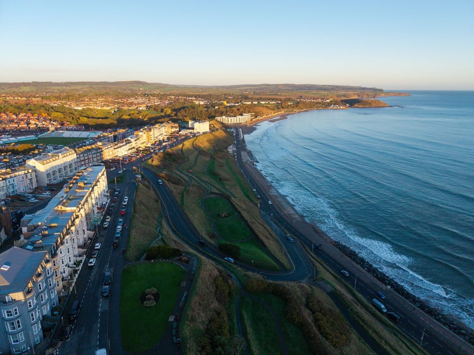The Apartments overlook Scarborough's beautiful North Bay and beach (at high tide)