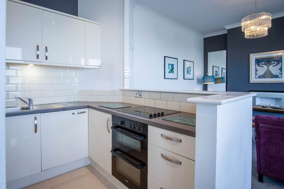 Open plan lounge, kitchen and dining room with stunning sea views