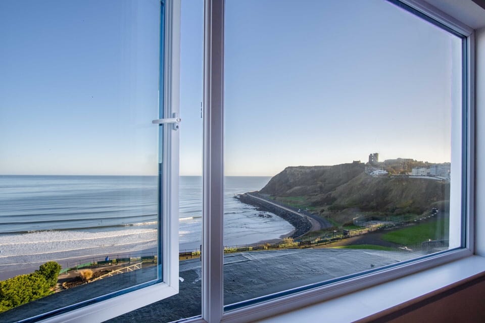 Sea View Penthouse Suite with super king bed, lounge area and amazing sea views