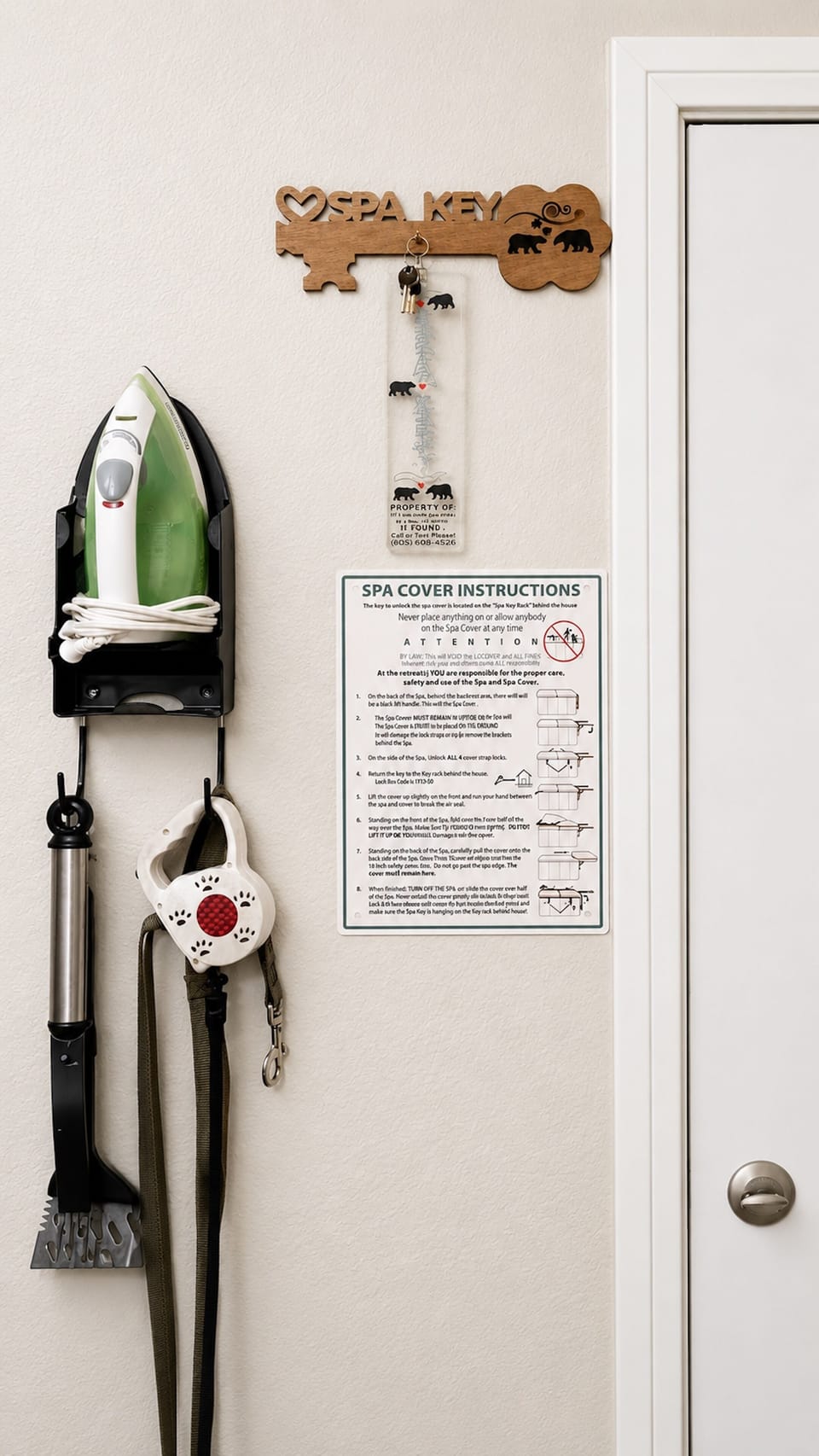 Pet-friendly entry: spa key, iron, and neatly organized essentials.