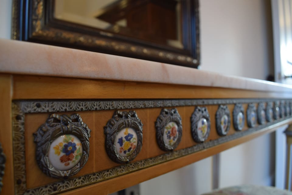 Antique furniture graces our apartments