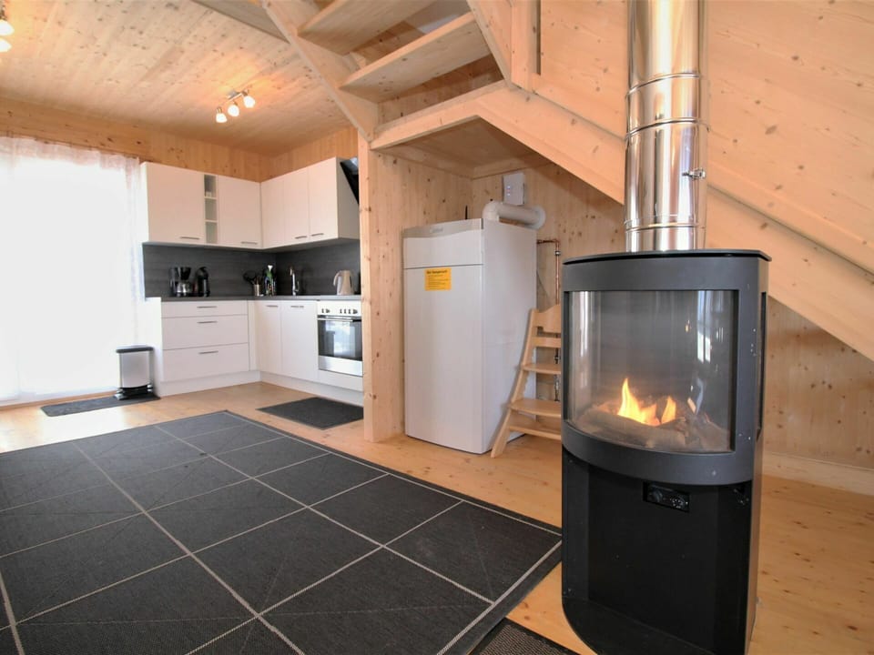 Property, Cabinetry, Wood, Flooring, Home Appliance, Interior Design, Floor, Kitchen Appliance, Stove