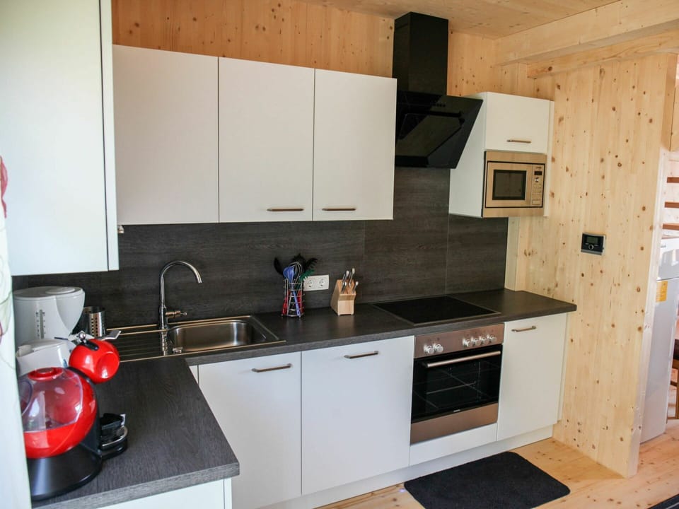 Cabinetry, Kitchen Sink, Property, Countertop, Sink, Tap, Kitchen Appliance, Kitchen Stove, Kitchen, Building