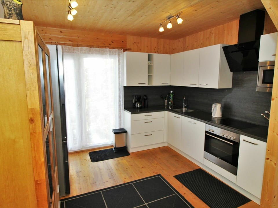 Cabinetry, Property, Countertop, Kitchen Appliance, Wood, Kitchen Stove, Interior Design, Home Appliance, Flooring, Floor