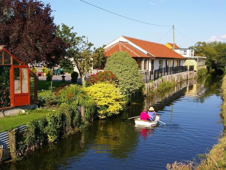 South facing View of the River Sheppey and De-luxe Riverside Suites.