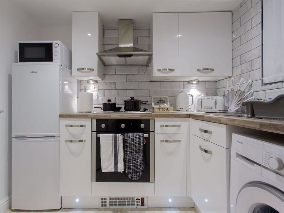 Kitchen in studio apartment 