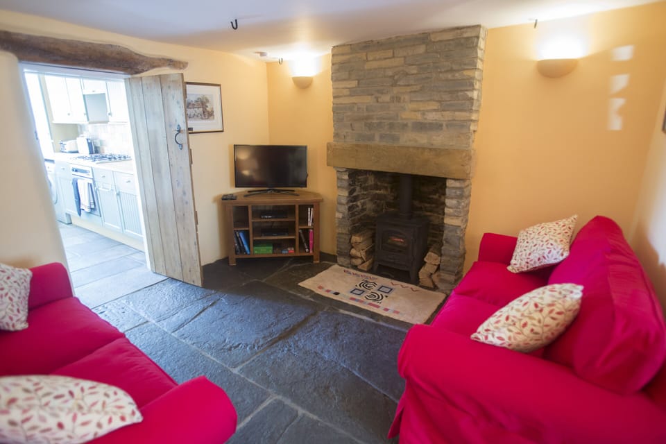 Comfy sitting room with wood burner
