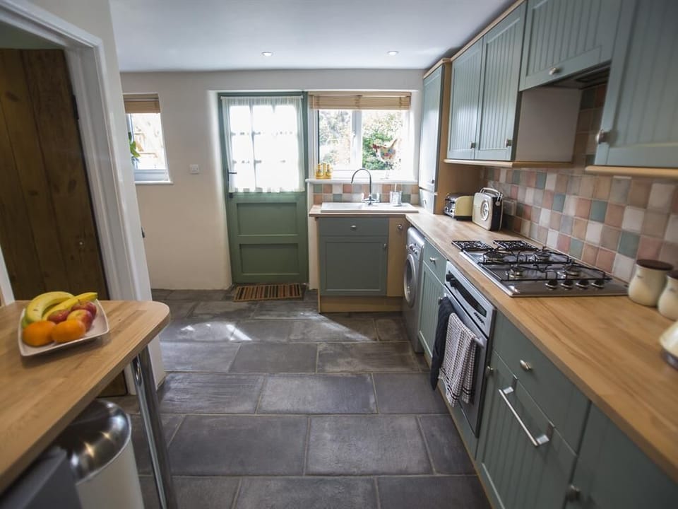 Fully equipped kitchen including general food store cupboard / fridge items.