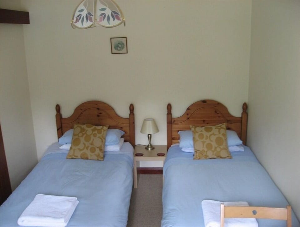 Bedrooms for Room 1, 2 and 3 either have a twin bed or double bed