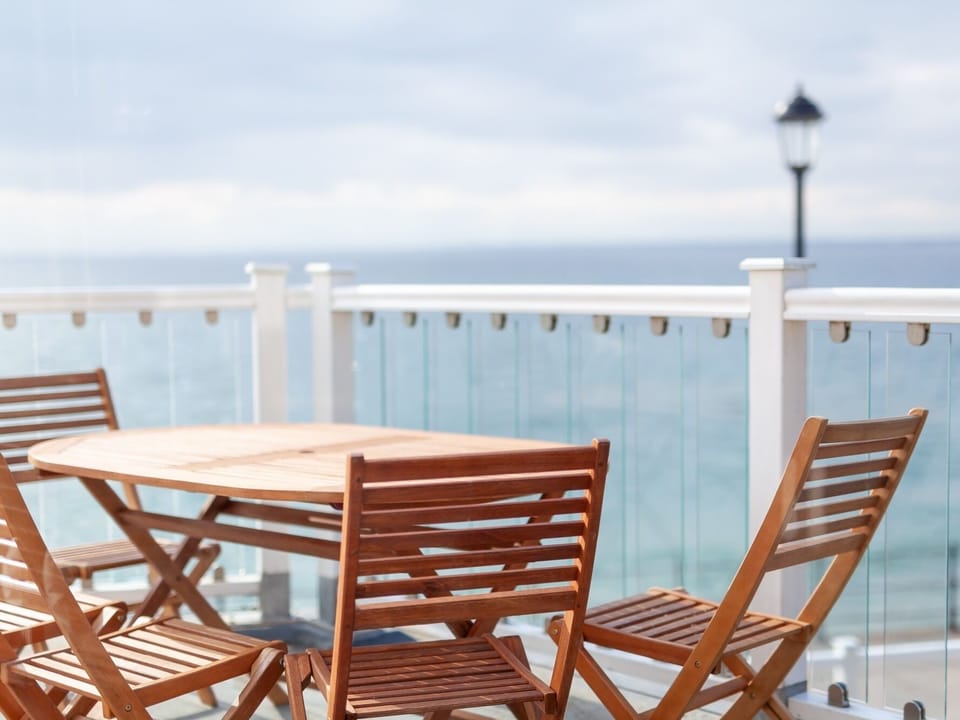 Outside terrace with a view across Totland Bay