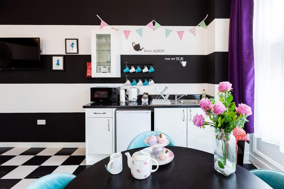 Mad Hatter's Tea Room - Kitchenette with fridge, microwave, kettle and toaster