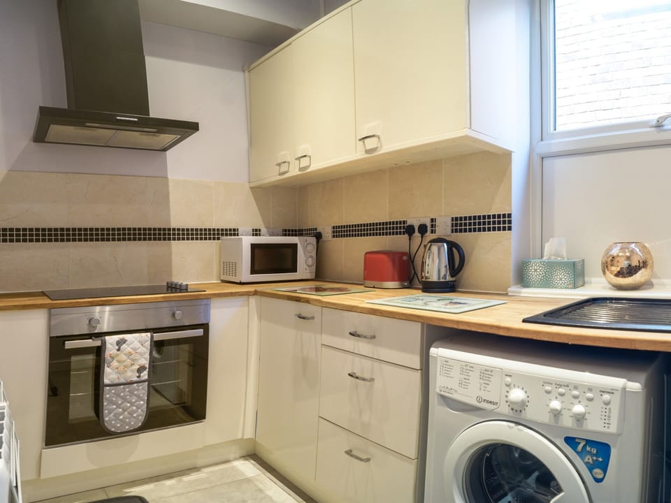 Shared Kitchen in the center of the Building for Guests use