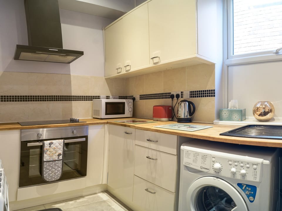 Shared Kitchen in the center of the Building for Guests use