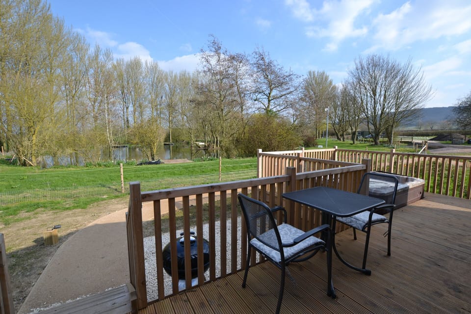 Private veranda with hot tub, BBQ & lake view