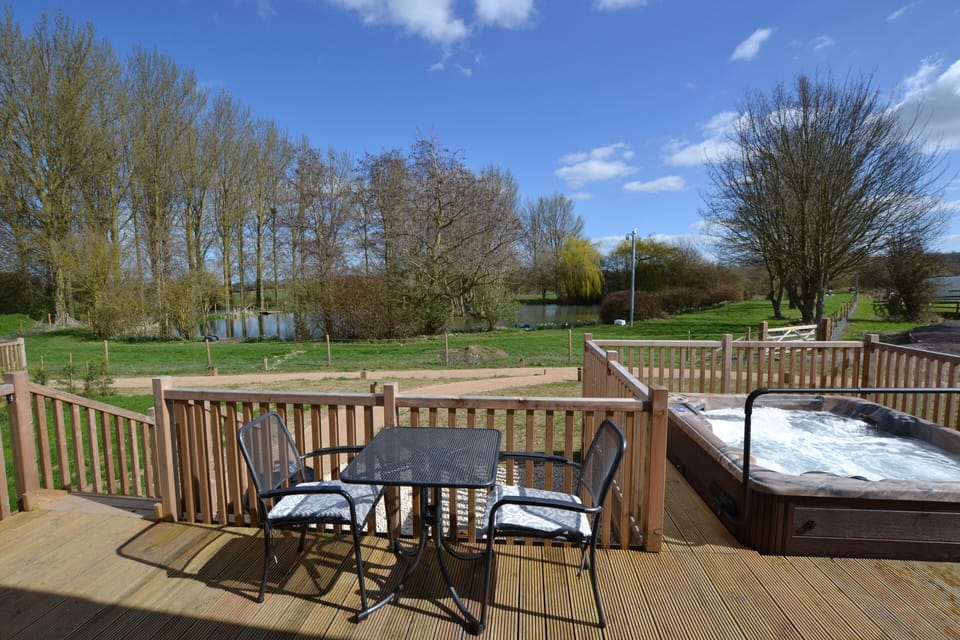 Private veranda with hot tub, BBQ & lake views