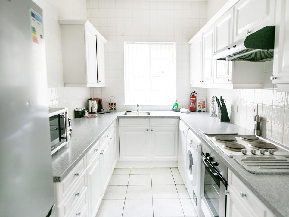 Bright modern kitchen with integrated appliances