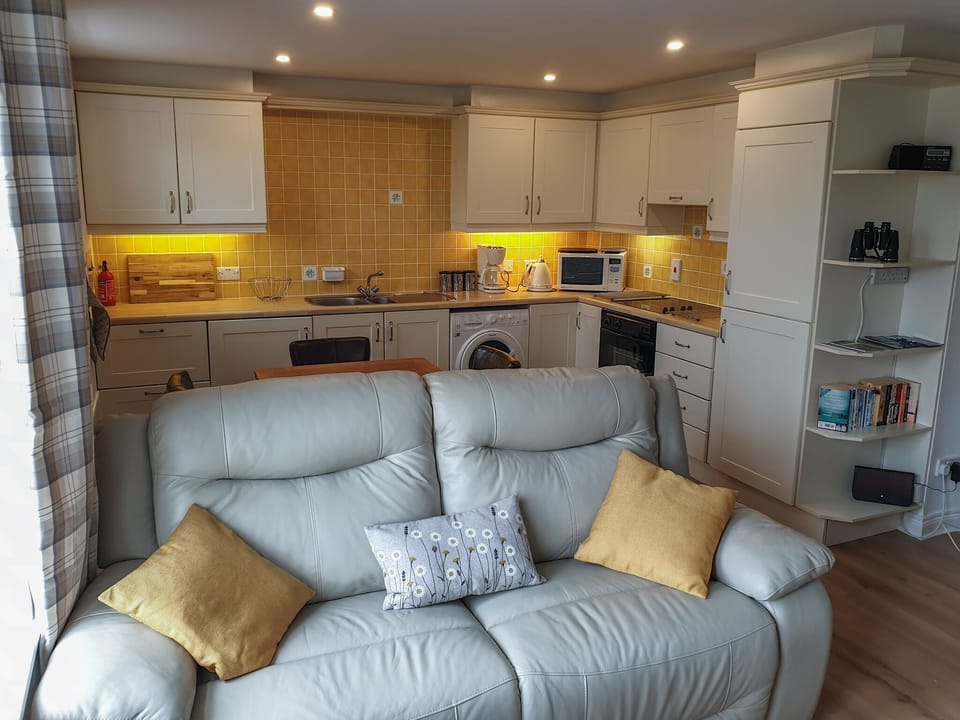 Living Area looking to Dining and Kitchen