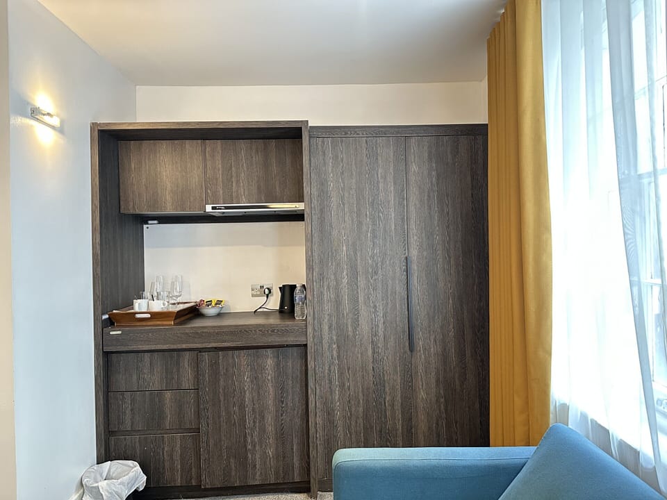 Stove, microwave, mini fridge, tea and coffee making facilities, glassware, private kitchen, plates, and more.