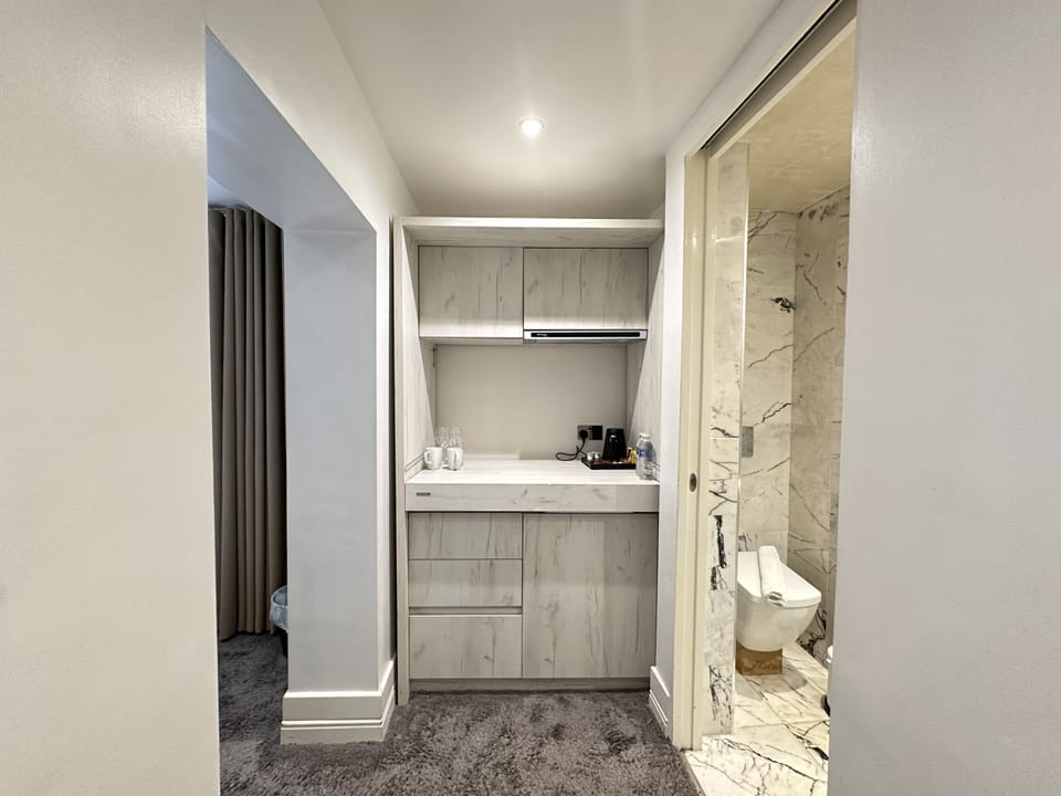 Stove, microwave, mini fridge, tea and coffee making facilities, glassware, private kitchen, plates, and more.